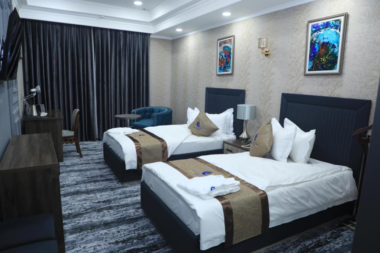 Tinchlik Plaza Hotel Navoi Exterior photo