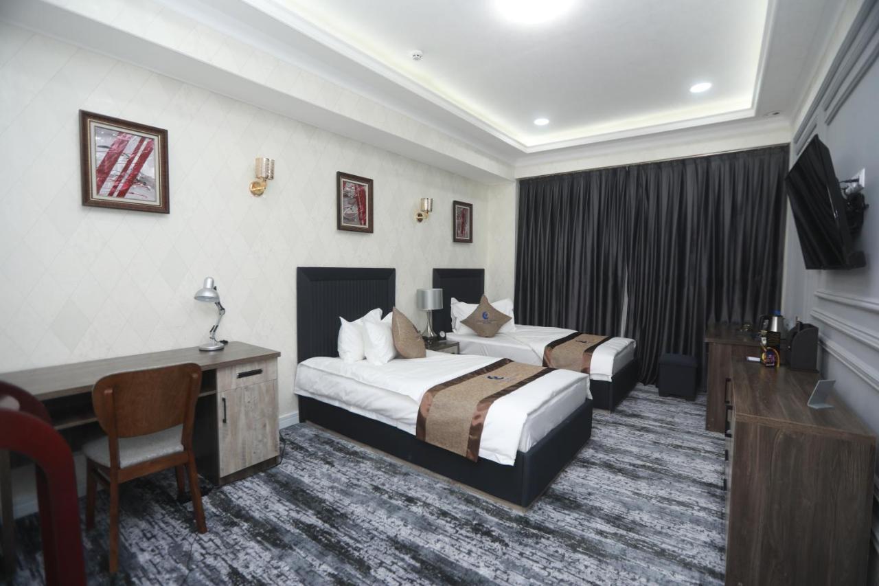 Tinchlik Plaza Hotel Navoi Exterior photo